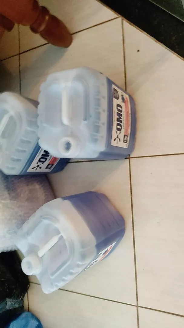 Galões OMO recebidos pelo cliente